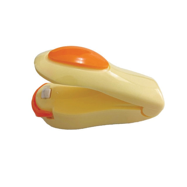 Mini termisk forsegler: Forsegl maten din på et øyeblikk for å holde den fersk